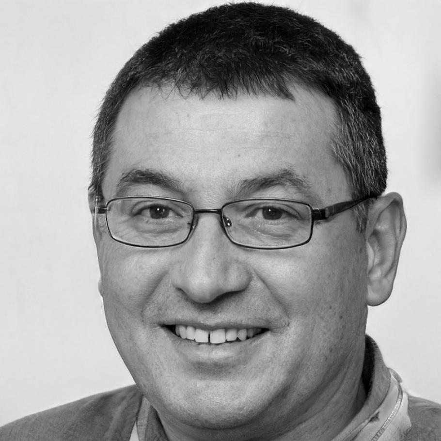 Finance professional reviewing quarterly investor reports